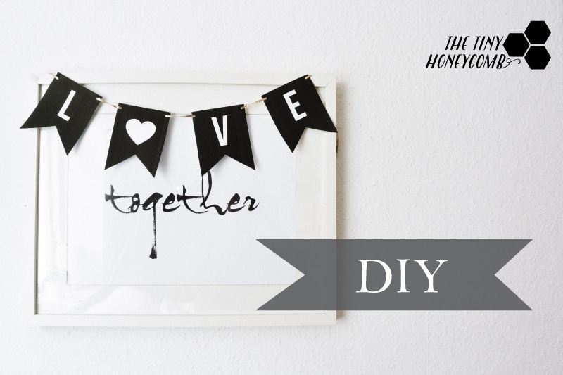 make your own love banner for valentine and you have yourself some easy and pretty decor for the holiday